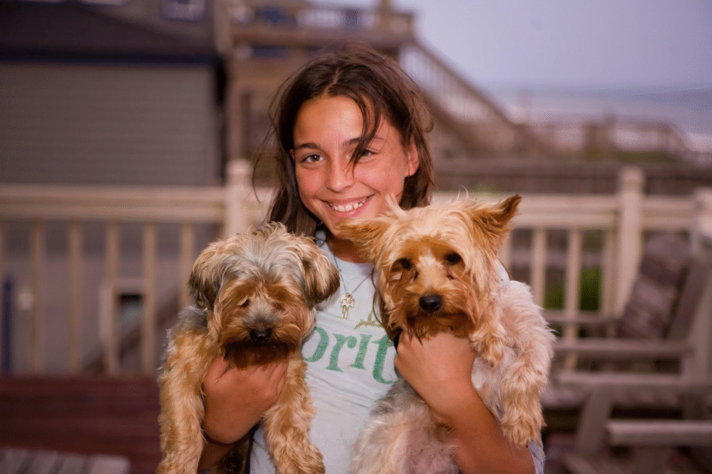 girl with two dogs